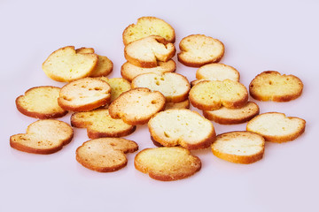 Toasted bread  (Italian bruschetta toasts) isolated on white background, Top view. Slices of toasted baguette