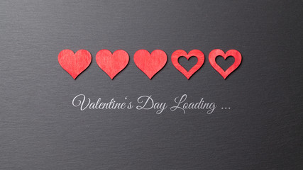 Valentines Day loading hearts on graphite background