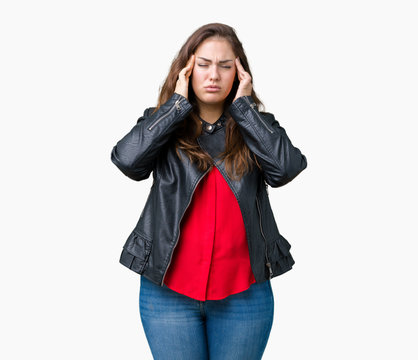 Beautiful plus size young woman wearing a fashion leather jacket over isolated background with hand on head for pain in head because stress. Suffering migraine.