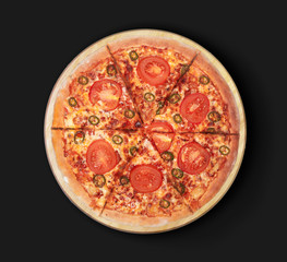 Isolated image of pizza with tomatoes and jalapeno on black background