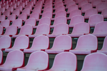 Fototapeta premium Red seats in the stadium. Empty seat of football stadium