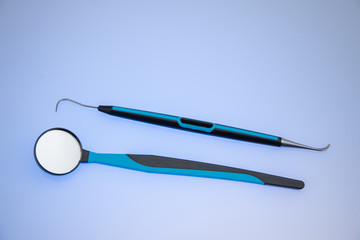 Dentist tools :Dental mirror and probe, periodontal scaler