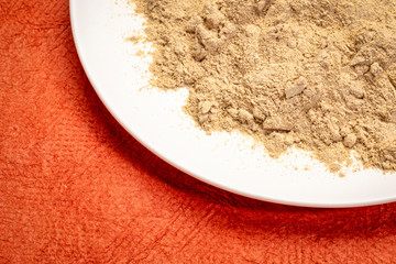 maca root powder on a plate