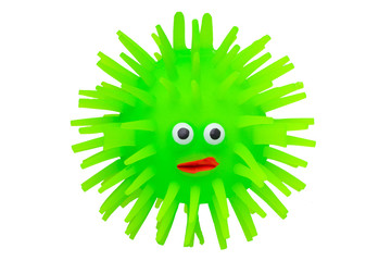 Rubber toys. Funny green puffer fish made of rubber. Cute toy fish isolated on a white background....