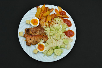 Traditional romanian food ,potato salad with barbecue 