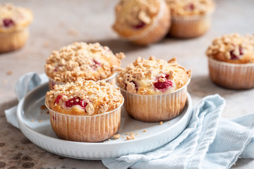 Fresh homemade delicious raspberry muffins on a table