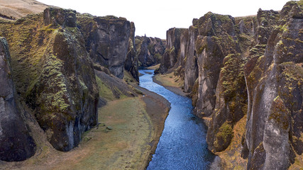 Deep Fjadrargljufur canyon and river flowing along the bottom of the canyon in south east Iceland