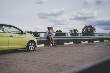 Couple in love traveling by car.