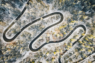 Severe snowfall on a alpine road in the mountains