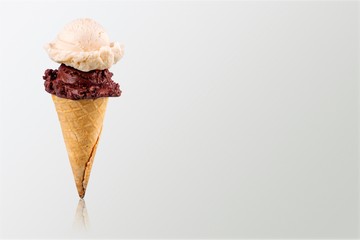 Tasty ,sweet Ice Cream  in the cone on background