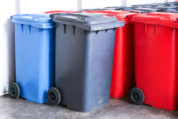 Group of new large colorful wheelie bins for rubbish, recycling waste,Large trash cans (garbage bins)