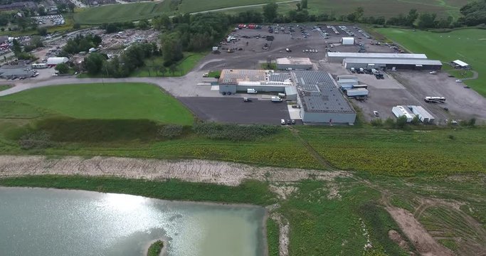 Flying Over Runoff Pond In Industrial Section