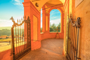 Entrance gate between the portico and the Sanctuary of San Luca. Famous place of Marian worship on...