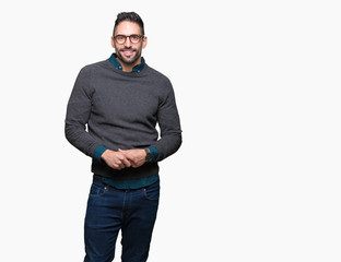 Fototapeta premium Young handsome man wearing glasses over isolated background Hands together and fingers crossed smiling relaxed and cheerful. Success and optimistic