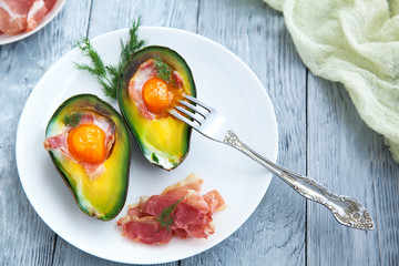 healthy Breakfast with avocado on wooden table