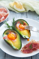 healthy Breakfast with avocado on wooden table