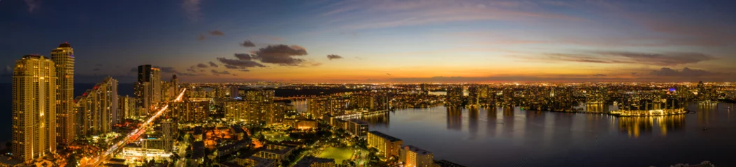 Foto op Plexiglas Aerial twilight photo Miami Sunny Isles Beach illuminated glowing city © Felix Mizioznikov
