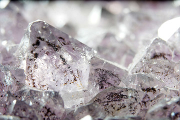 Quartz also called deep quartz photographed in studio in front of black background in Marco mode 