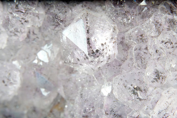 Quartz also called deep quartz photographed in studio in front of black background in Marco mode 