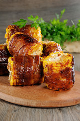 Grilled corn wrapped in bacon