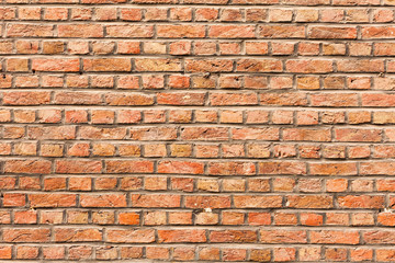 Old red brick wall background texture close up. bricked wall textured pattern for continuous replicate.