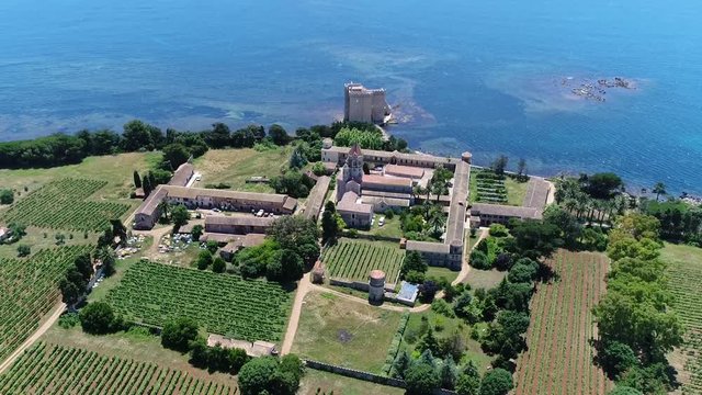 Aerial view of Lerins Abbey a Cistercian monastery on the island of Saint-Honorat located on the French Riviera with an active monastic community today the monks cultivate vineyards 4k high resolution