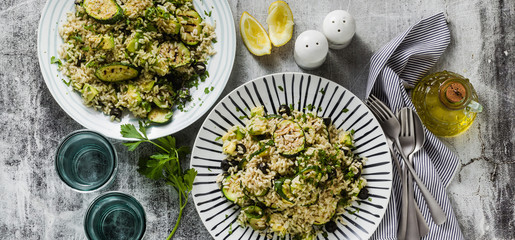 banner of salad with rice with zucchini, avocado, olives and capers. healthy spring summer vegan cuisine recipe for the whole family or partyni, avocado, olives and capers. 