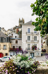 Notre-Dame de l'Assumption above Quai Brizeux at Quimperle. Finistere, Brittany, France