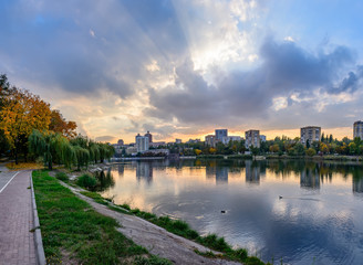 Fototapeta premium View of the evening embankment of the Kalmius river in Donetsk