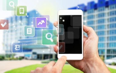 Smartphone back behind black blank business camera