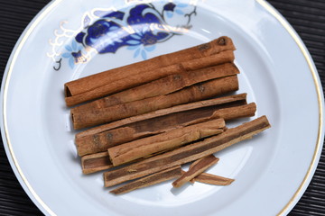 Cinnamon sticks on plate