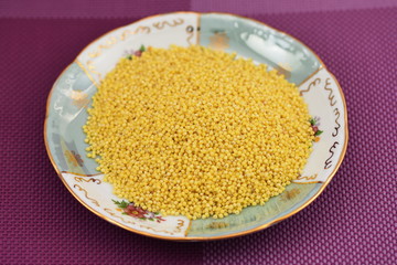 hulled millet (Panicum miliaceum) grains