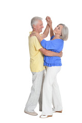 Fototapeta na wymiar portrait of senior couple dancing on white background