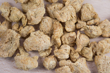 soy cubes on a wooden plate