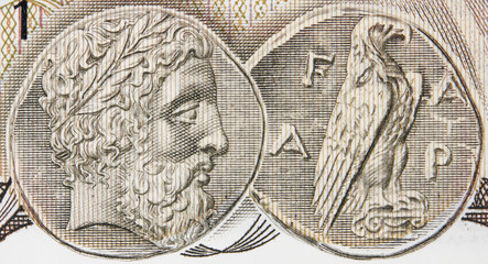 Ancient Greek coin on old Greece 1000 drachma (1987) banknote, vintage retro engraving. Zeus and eagle..