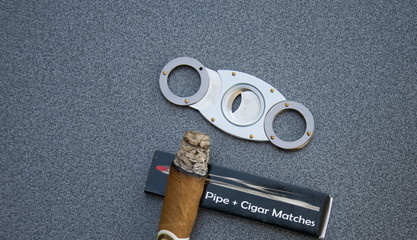 brown cigar  and  cutter