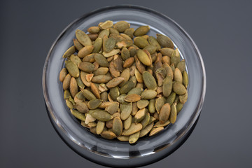Roasted Pumpkin Seeds  on transparent dish