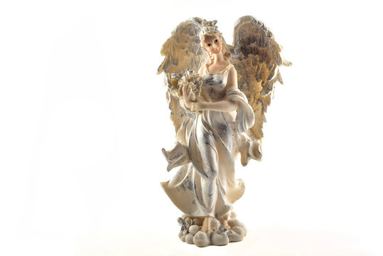 Figurine of an angel on a white background