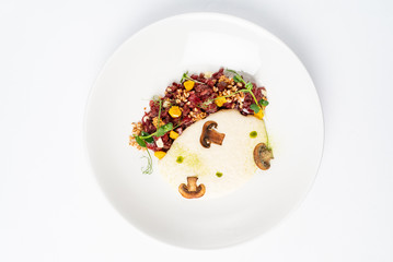 plate with delicious tartare and mushroom puree. Isolated on the white background