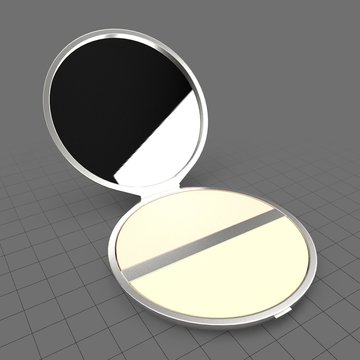 Powder compact with mirror
