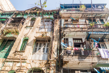 Fototapeta premium Old dilapidated colonial building in Yangon, Myanmar