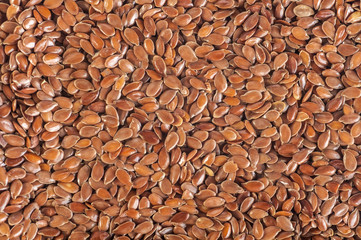 flax seeds background, top view