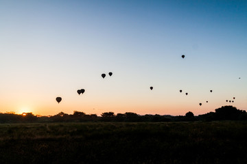 Silhouettes of hot air balloons in Bagan, Myanmar