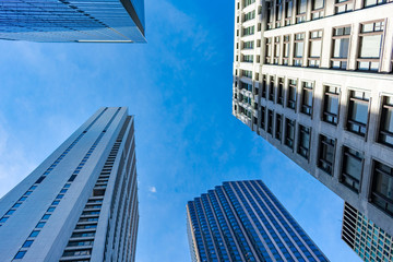 Fototapeta na wymiar Upwards View of Multiple Skyscrapers in Downtown Chicago