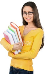 Beautiful young female student carrying school books