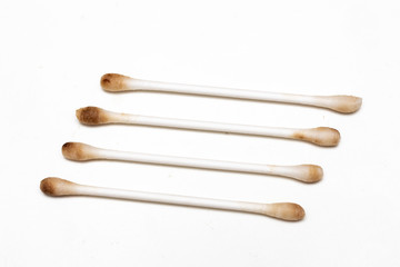 Cotton swabs dirty with cerumen