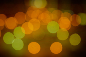 Colorful beautiful blurred bokeh background with copy space.multicolored light spots on dark background, defocused