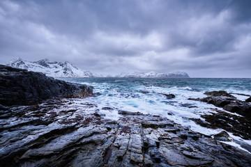 Norwegian Sea waves on rocky coast of Lofoten islands, Norway