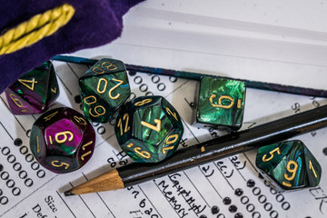 dice pencil and character sheet for role playing games