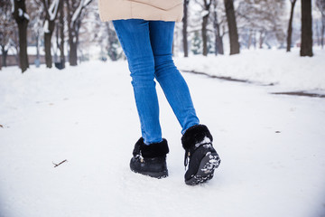 Woman walking in snow time